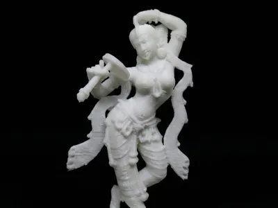 Apsara applying vermillion