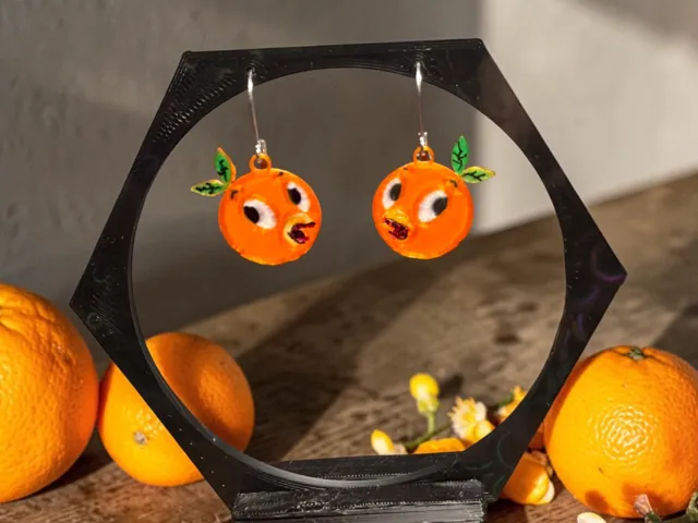 Disney's Orange bird head earrings