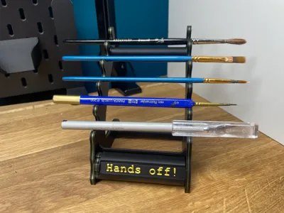 Brushholder with replacable and turnable Nameplate