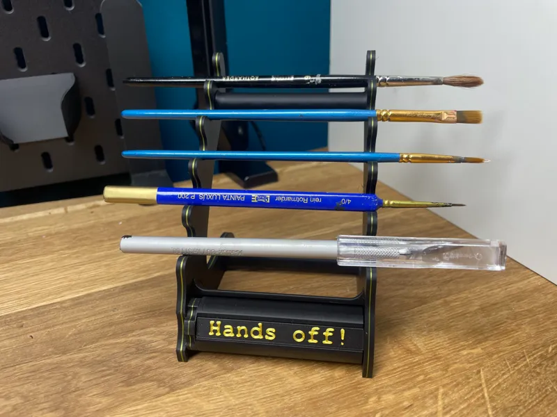 Brushholder with replacable and turnable Nameplate