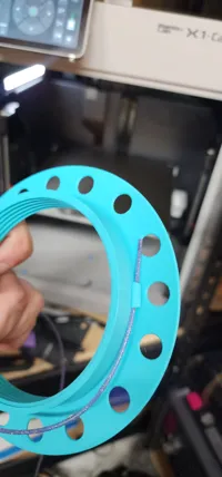 Spool with filament anchor for winding