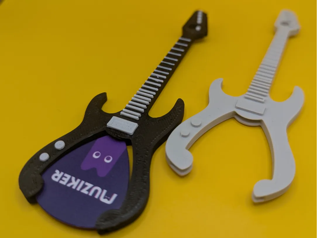 Guitar pick guitar-keychain by Source robotics MakerWorld: Download Free 3D Models - 3D model önizlemesi