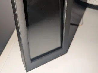 Wall phone holder - for use with command strips