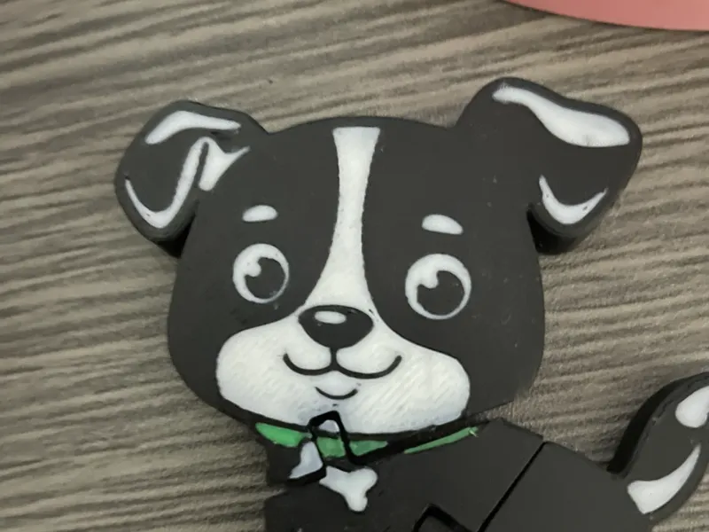 Black and white flexi dog