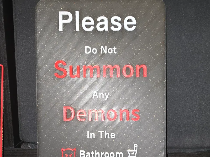 summon demons bathroom sign