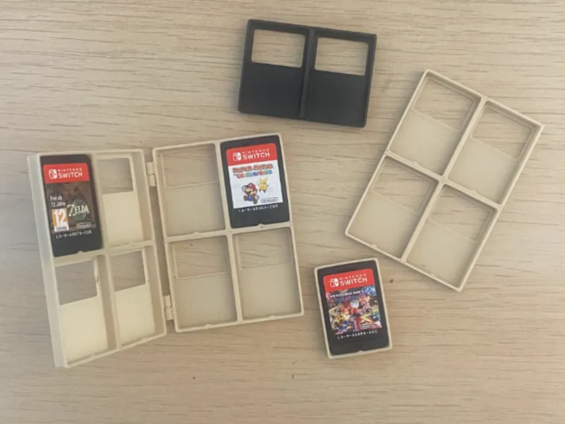 Compact portable switch game cartridge holder