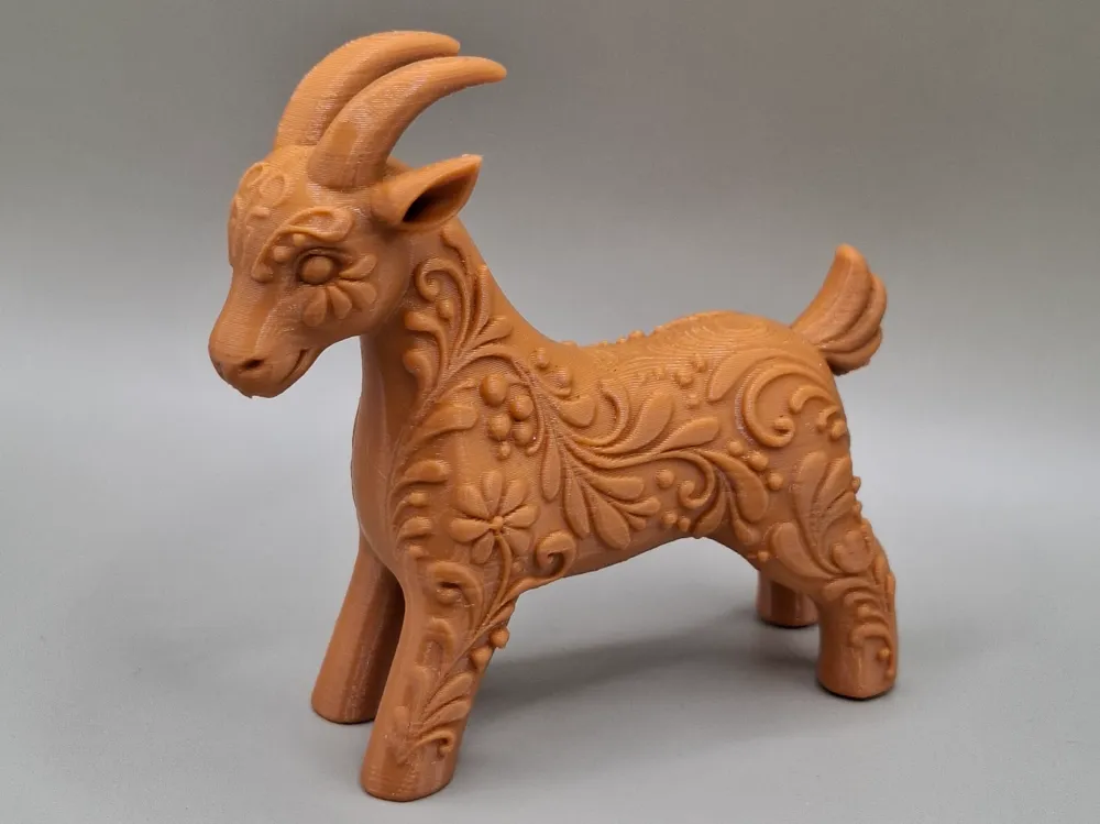 Figura decorativa: Decorative Goat Figurine. Referencia del modelo original.