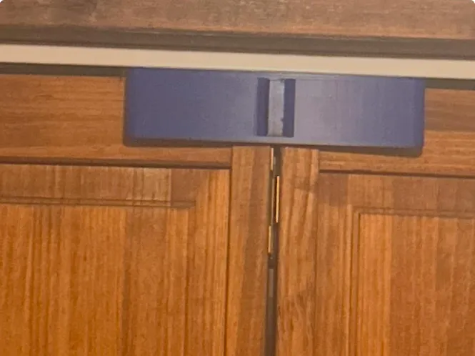 Bi-fold closet door lock for children and pets