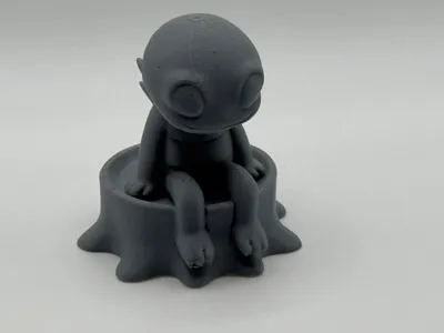 Chibi Alien sitting on a Tree