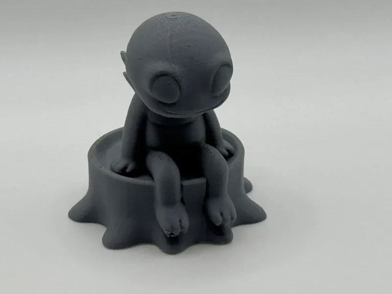 Chibi Alien sitting on a Tree
