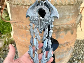 Monster Hunter pendant. Arkveld: Mark of Resolve.