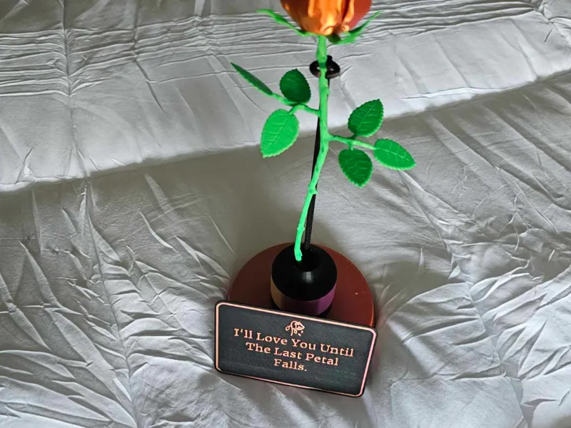 rose with base and sign