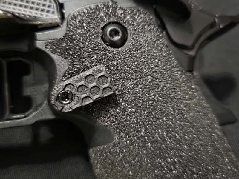 2011-DS1911 extended mag release button