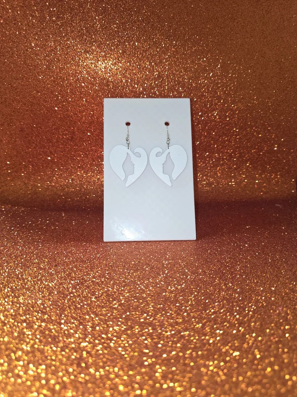 Woman's heart hair earrings view 2