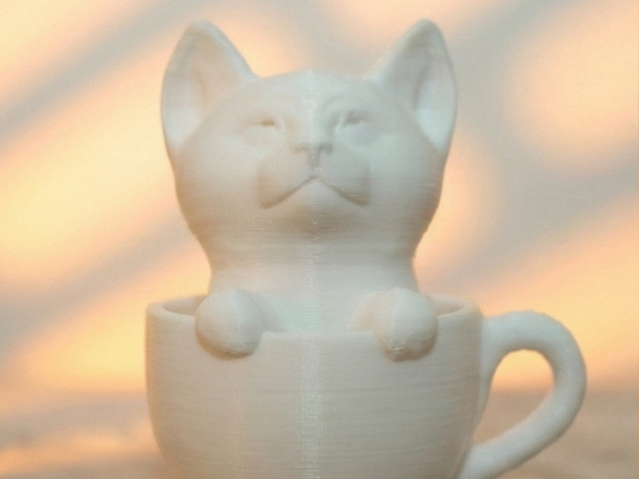 Peeking Kitty figurine