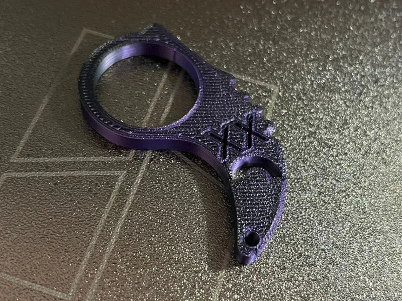 Keyrambit keychain sad face
