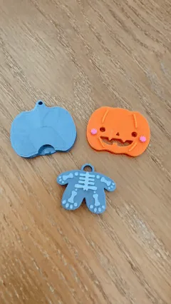 Pumpkin Baby Bones earring / keychain view 2