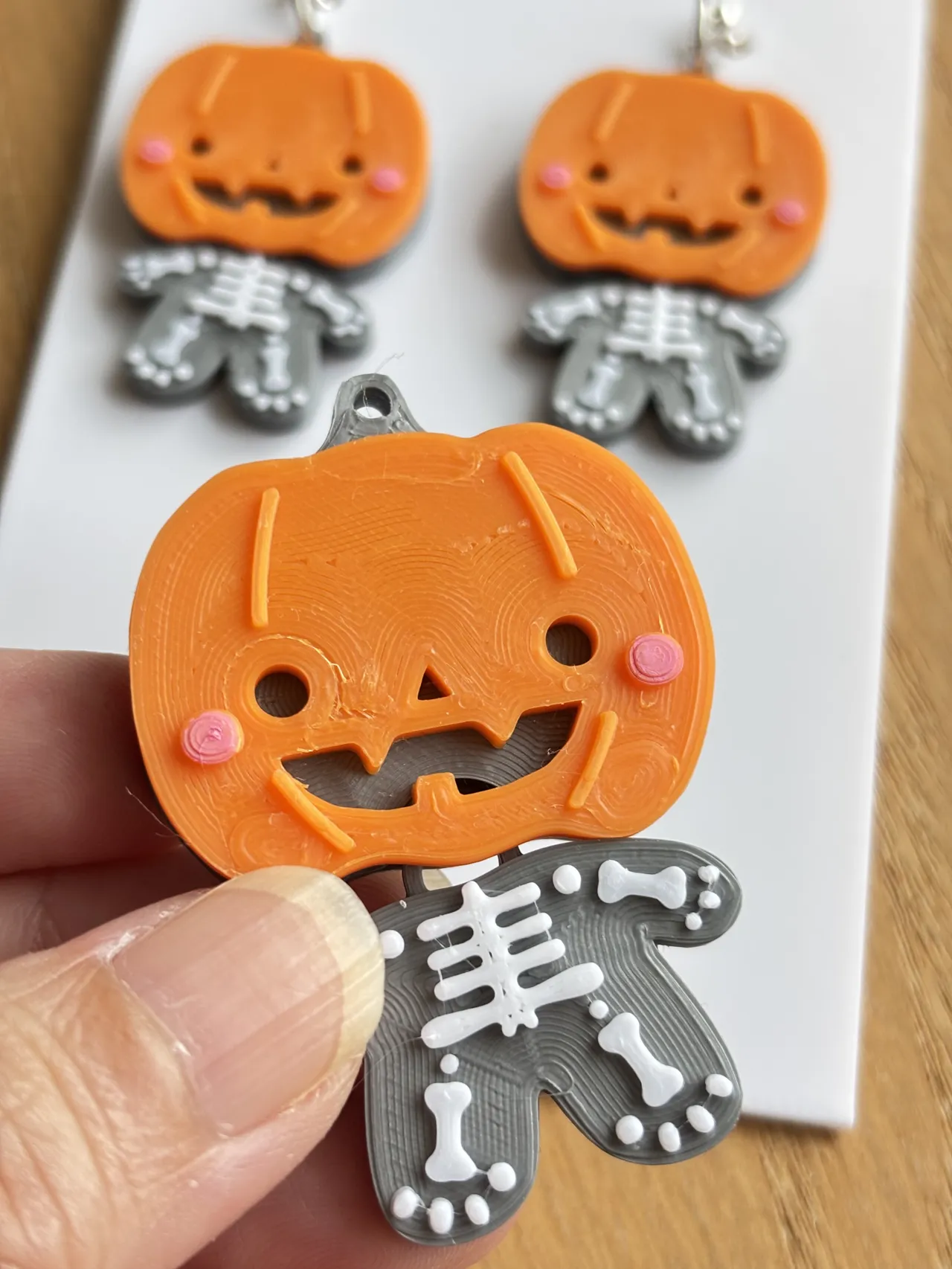 Pumpkin Baby Bones earring / keychain view 4