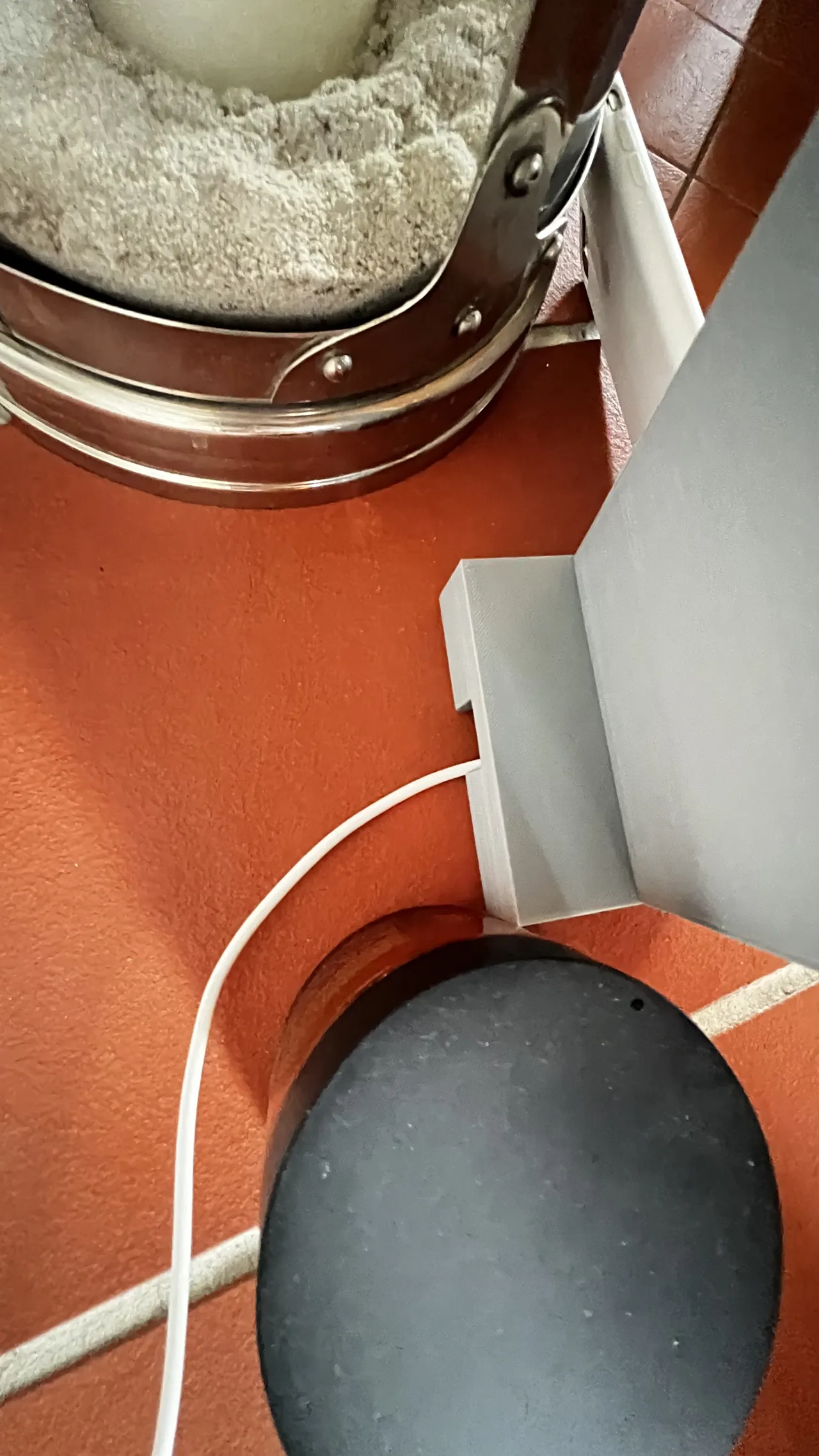 Phone-stand with holes for a charging cable view 4