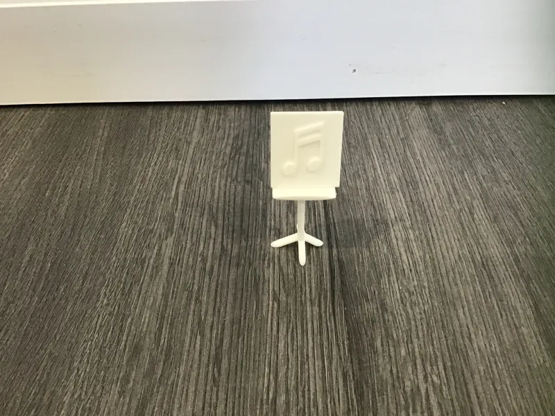 muic stand for dolls