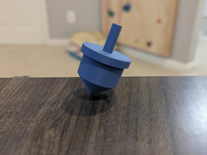 Spinning Top and Holder
