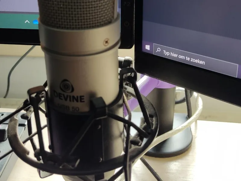 Microphone arm for monitor stand