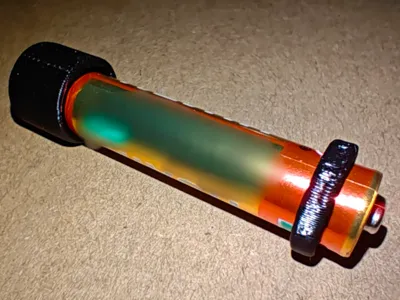 An AAA to AA battery adapter shell