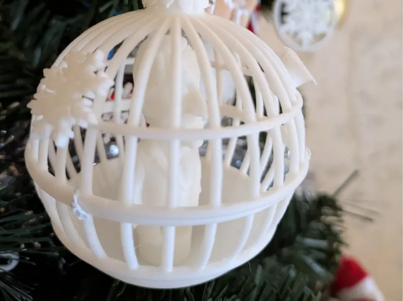 Boule de Noël Sarkozy en cage