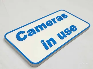 Cameras in use sign