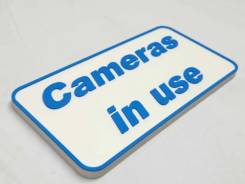 Cameras in use sign