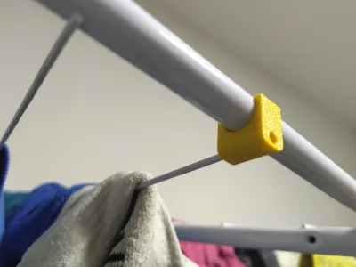 Wire Holder Rescues Broken Laundry Rack