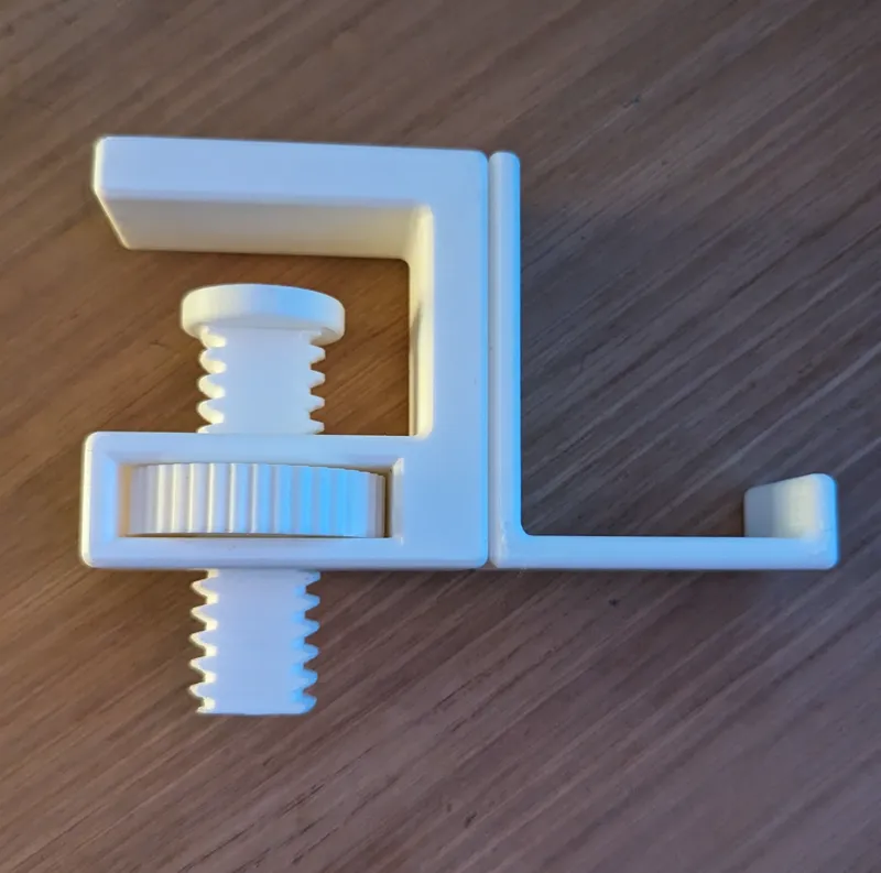 Simple modular clamp with hook for headphones