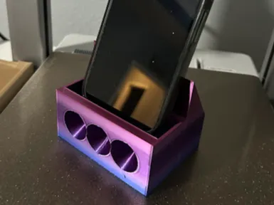 Cellphone stand with amplifier