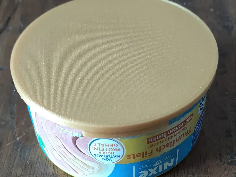 Lids for small round tins