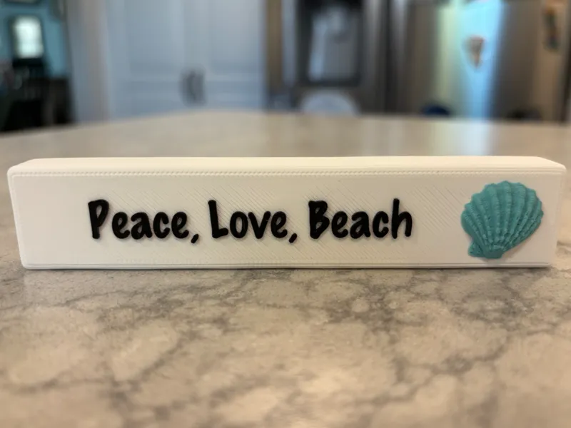 "Peace, Love, Beach" sign
