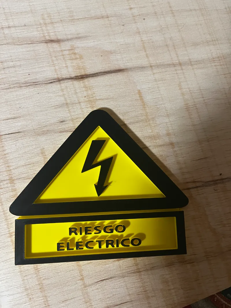 Placa riesgo electrico