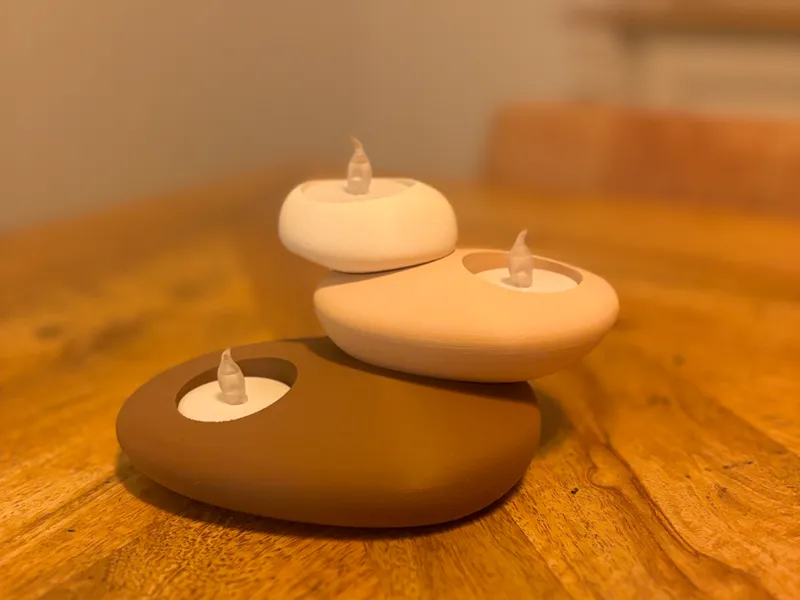 Pebble stones tea light