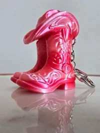 0.12mm layer, 2 walls, 15% infill 50mm Tall w/ keychain hole