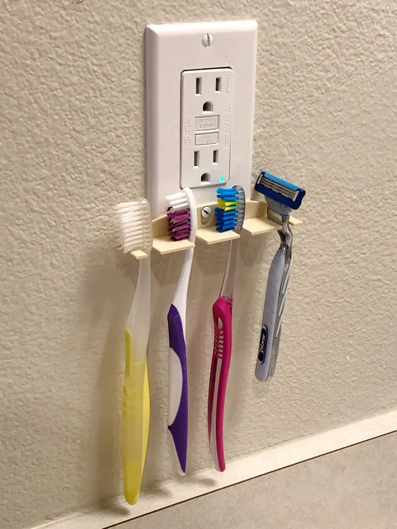 Outlet Toothbrush Holder