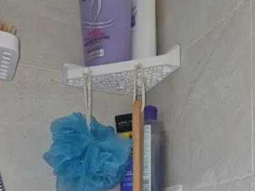 Corner shower shelf (added screw holes and hooks)