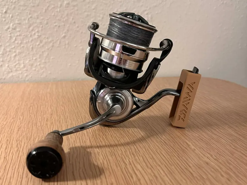 Daiwa fishing reel holder - wall mount