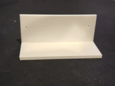 Small shelf with holes