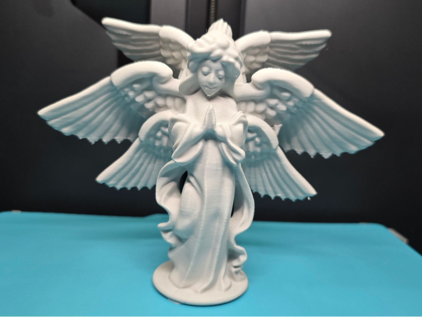 Angel with triple wings