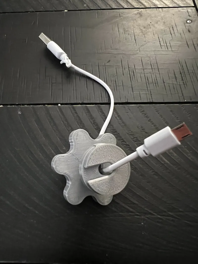 Low Profile Cord holder for nightstand / headboard