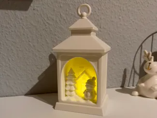 Winterlaterne „Schneemann & Haus im Lichterglanz“