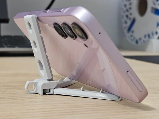 Foldable phone stand (automatic arms)