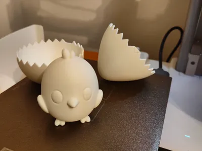 Breakable egg with chick