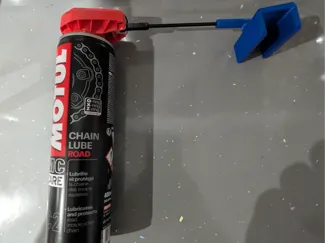 Motorcycle chain lube applicator