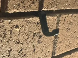 brick wall mortar joint hanger