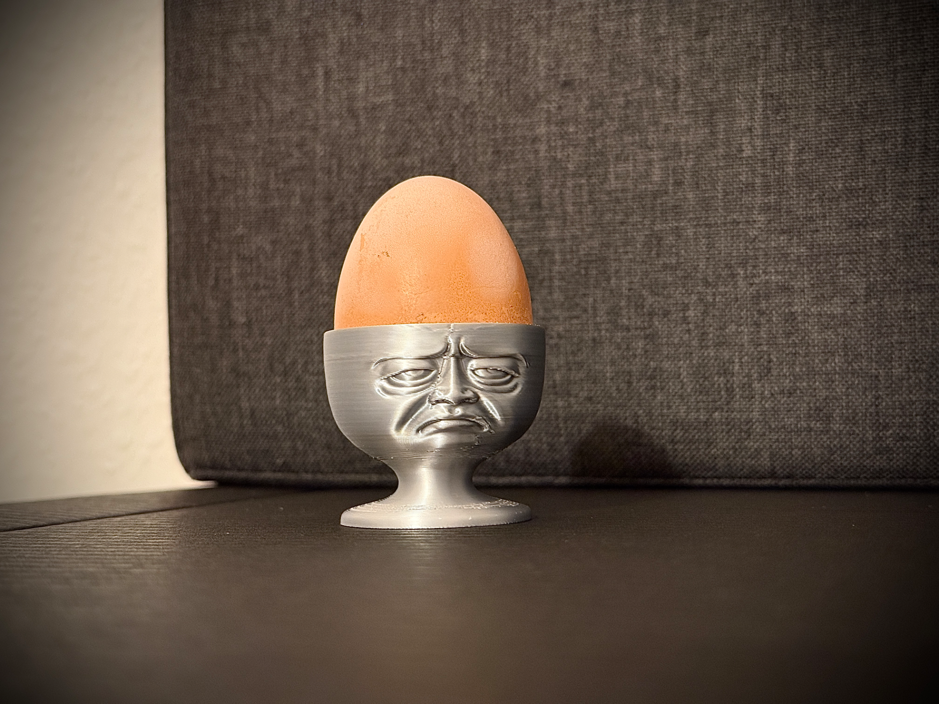 Grumpy face egg cup